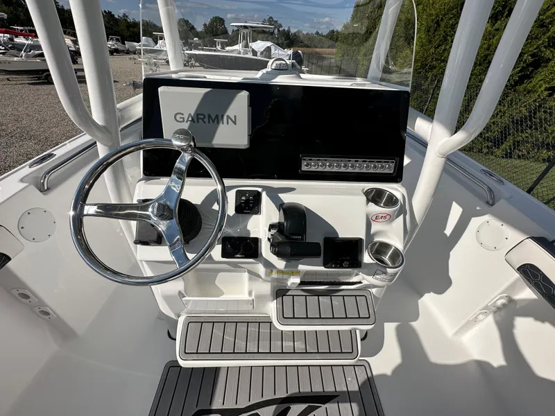 Slide: The Image of 2024 Tidewater 210 CC Adventure boat console with Garmin navigation system. - 26