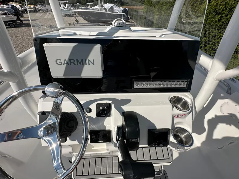 Slide: The Image of 2024 Tidewater 210 CC Adventure boat console with Garmin navigation system. - 32