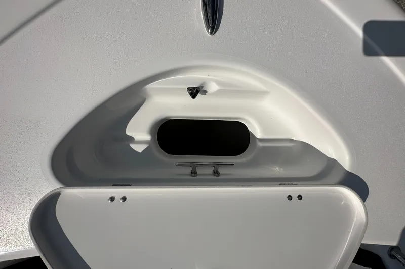Slide: The Image of 2024 Tidewater 210 CC Adventure boat storage compartment. - 6