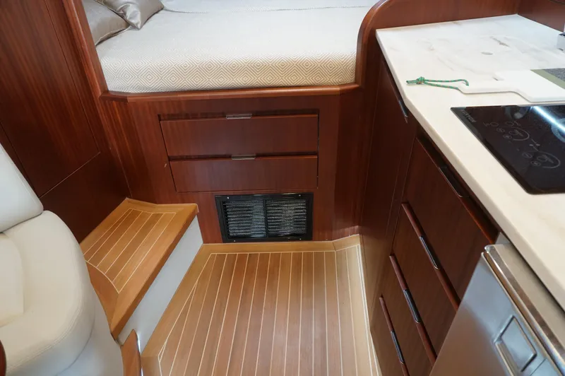Slide: The Image of Interior of 2021 Jupiter 41 SB yacht with wooden flooring and cabinetry. - 28