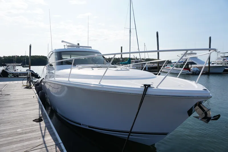 Slide: The Image of Jupiter 41 SB 2021 yacht docked, sleek design. - 4