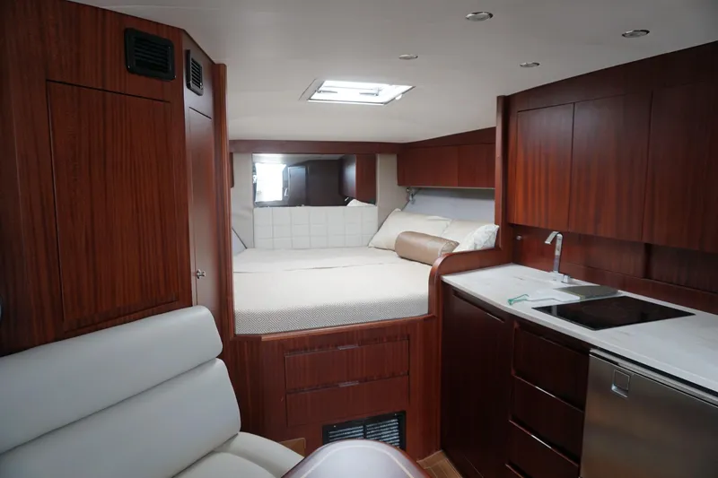 Slide: The Image of Luxurious interior of 2021 Jupiter 41 SB yacht with wood finish and modern amenities. - 41