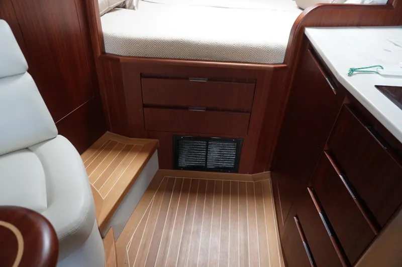 Slide: The Image of Interior of 2021 Jupiter 41 SB yacht with wooden cabinetry and flooring. - 43