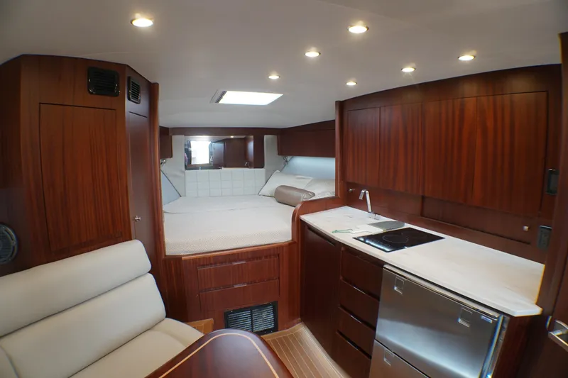 Slide: The Image of Luxurious interior of 2021 Jupiter 41 SB yacht with wood finish and modern amenities. - 49
