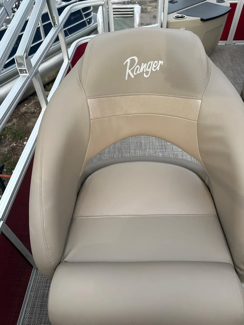 Slide: The Image of 2024 Ranger Reata 200F boat seat with beige upholstery. - 11