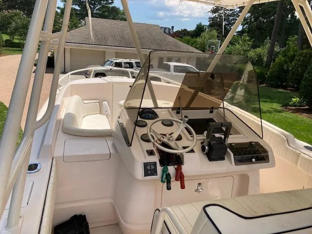 Slide: The Image of Interior view of a 2002 Intrepid 322 boat with helm console. - 5