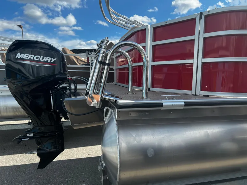 Slide: The Image of 2024 Bentley Pontoons LE 18 with Mercury outboard motor. - 4