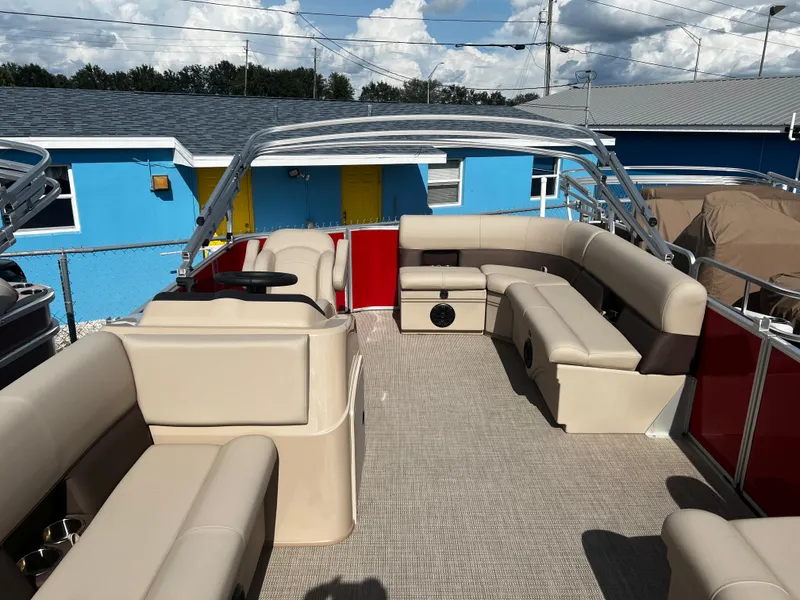 Slide: The Image of 2024 Bentley Pontoons LE 18 with spacious seating and modern design. - 6