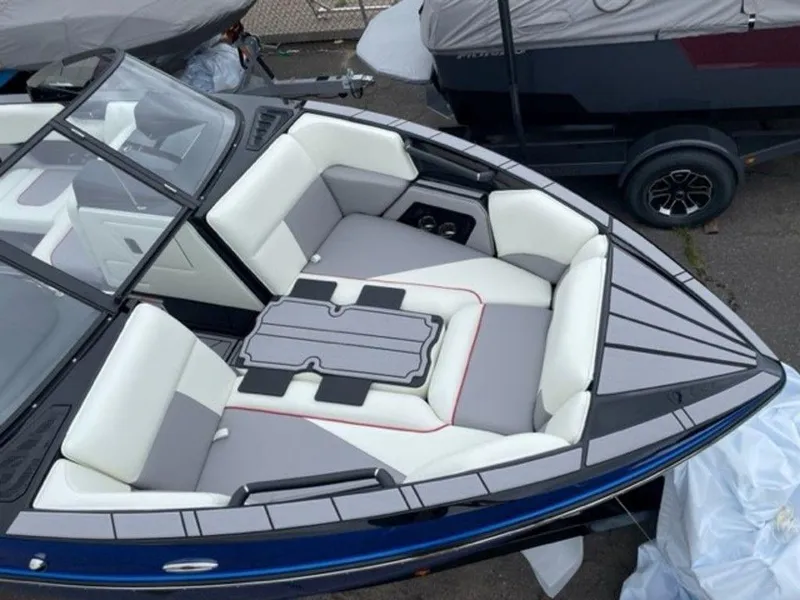 Slide: The Image of 2024 Moomba Craz boat with spacious seating and modern design. - 7