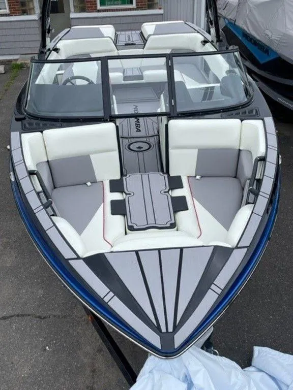 Slide: The Image of 2024 Moomba Craz boat with sleek design and spacious seating. - 8