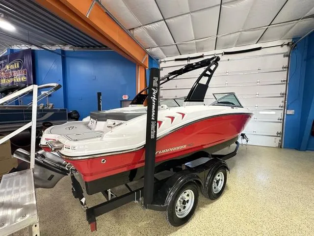Slide: The Image of 2024 Chaparral 21 SSi boat on trailer in indoor showroom. - 3