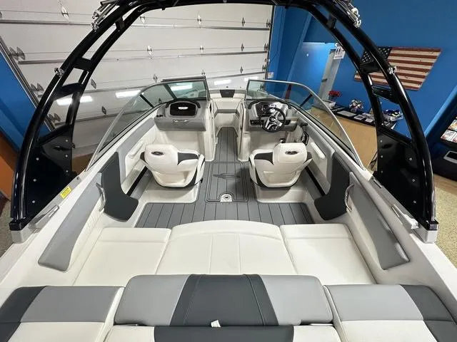 Slide: The Image of 2024 Chaparral 21 SSi boat interior with modern seating and sleek design. - 5