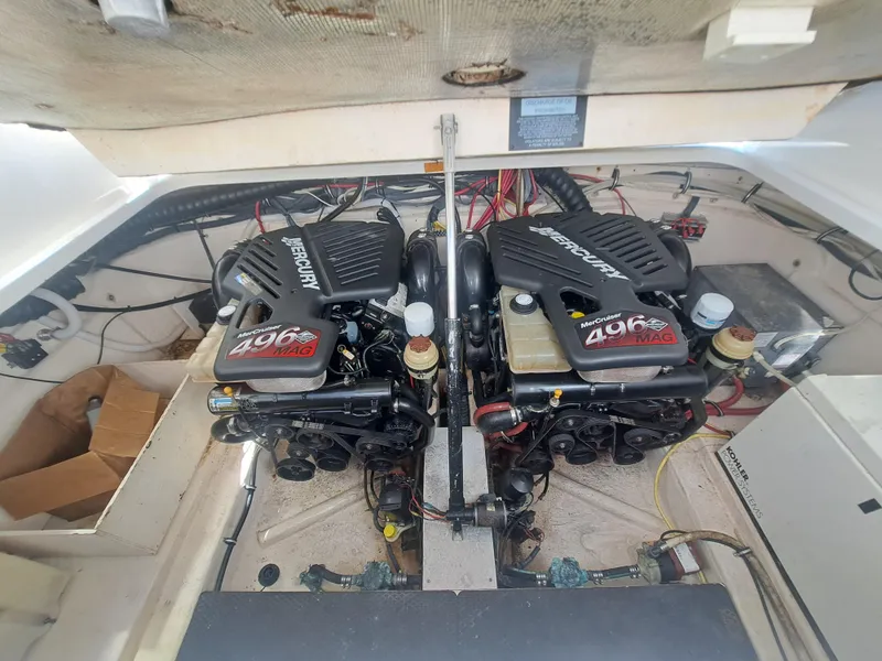 Slide: The Image of 2005 Chaparral 330 Signature Cruiser engine compartment with twin MerCruiser 496 MAG engines. - 10