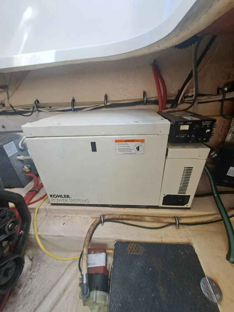 Slide: The Image of Kohler generator in the engine compartment of a 2005 Chaparral 330 Signature Cruiser. - 11