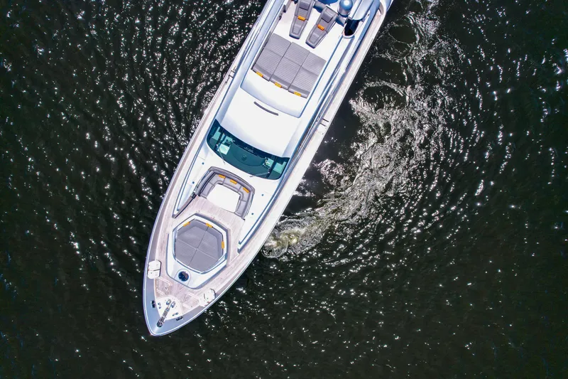 Slide: The Image of Aerial view of 2007 Pershing 90 yacht cruising on water. - 13