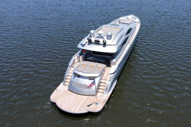 Slide: The Image of 2007 Pershing 90 luxury yacht on open water. - 14