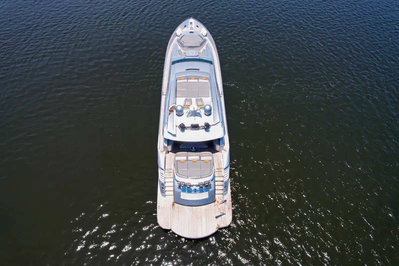 Slide: The Image of Aerial view of a 2007 Pershing 90 yacht on calm waters. - 21