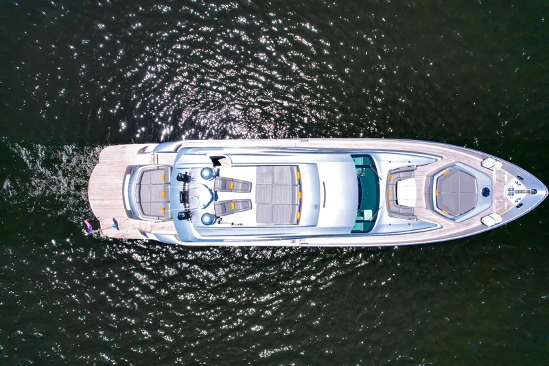 Slide: The Image of Aerial view of a 2007 Pershing 90 yacht cruising on water. - 22