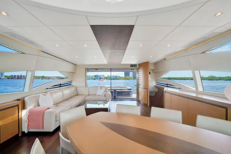 Slide: The Image of Luxurious interior of a 2007 Pershing 90 yacht with panoramic windows and modern furnishings. - 24