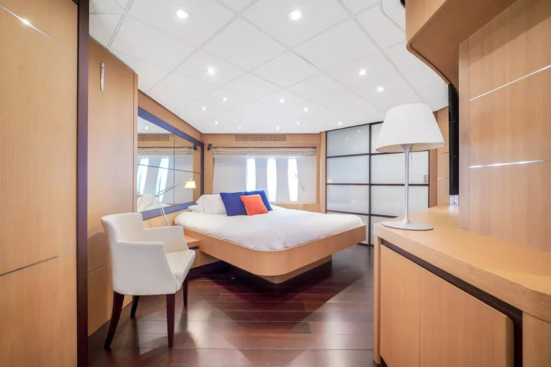 Slide: The Image of Luxurious bedroom interior of 2007 Pershing 90 yacht with modern furnishings. - 37