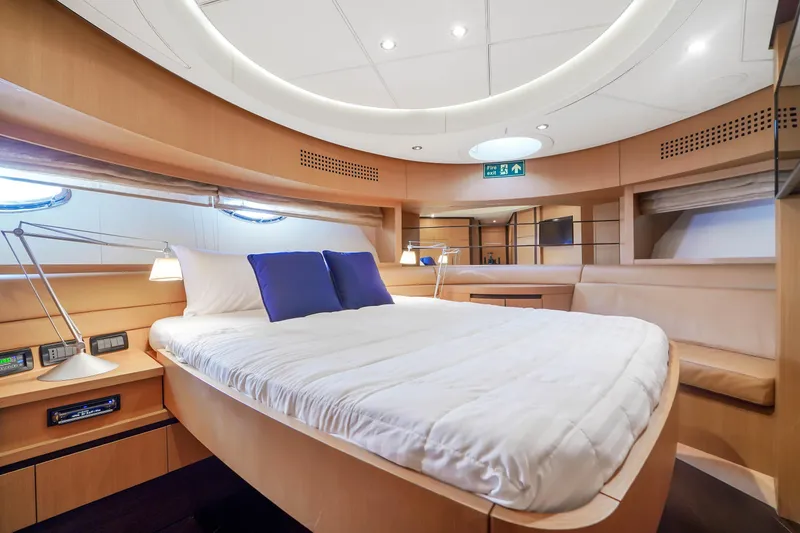 Slide: The Image of Luxurious bedroom interior of 2007 Pershing 90 yacht with modern design and cozy bedding. - 41