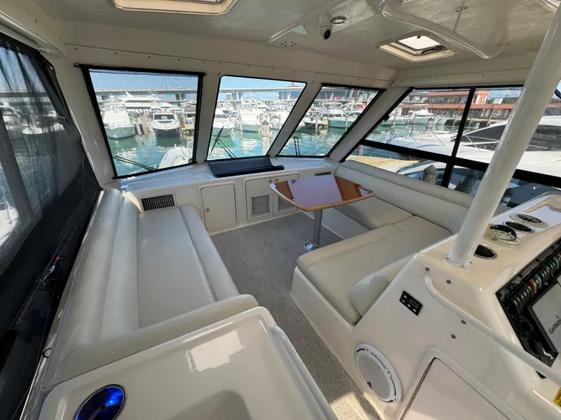 Slide: The Image of Luxurious 2003 Riviera 48 yacht interior with panoramic marina views. - 20