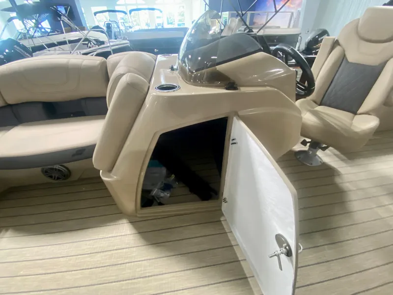 Slide: The Image of 2024 Starcraft SLS 3 Q DH boat interior with open storage compartment. - 25