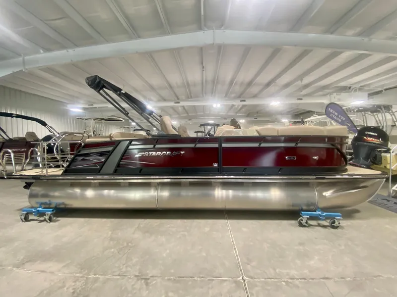 Slide: The Image of 2024 Starcraft SLS 3 Q DH pontoon boat in showroom. - 0
