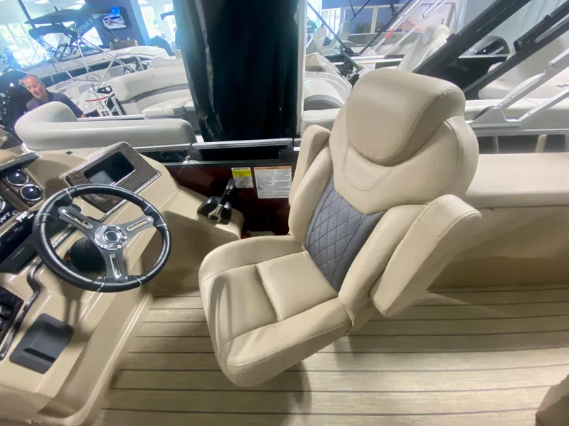 Slide: The Image of 2024 Starcraft SLS 3 Q DH boat captain's chair and steering console. - 17