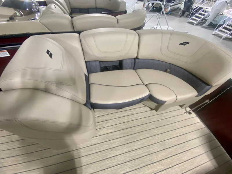 Slide: The Image of 2024 Starcraft SLS 3 Q DH boat interior seating with beige upholstery. - 29