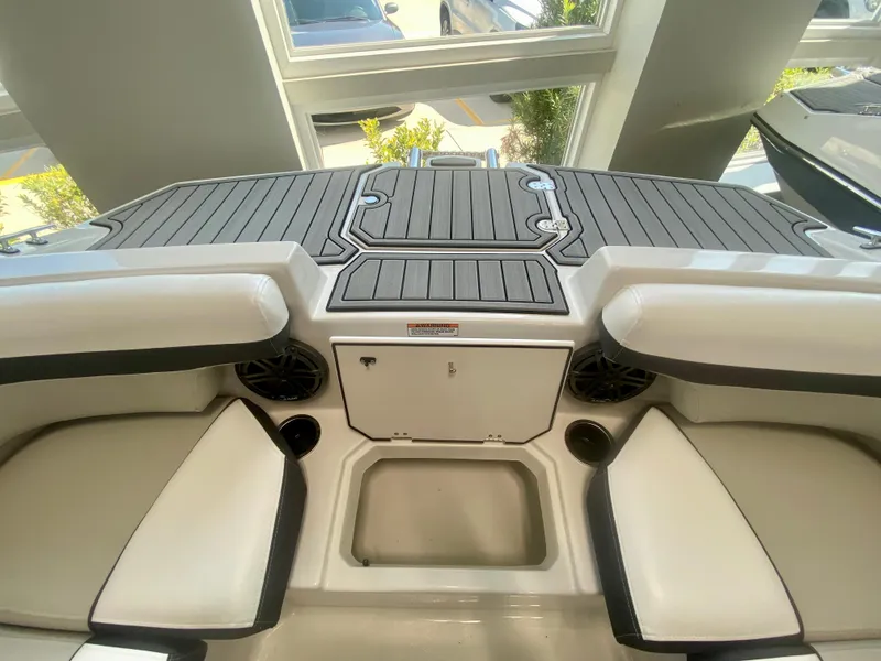 Slide: The Image of 2024 Starcraft SVX 191 boat interior with seating and storage compartments. - 23