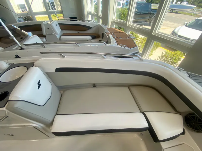 Slide: The Image of 2024 Starcraft SVX 191 boat interior with white and black seating. - 24