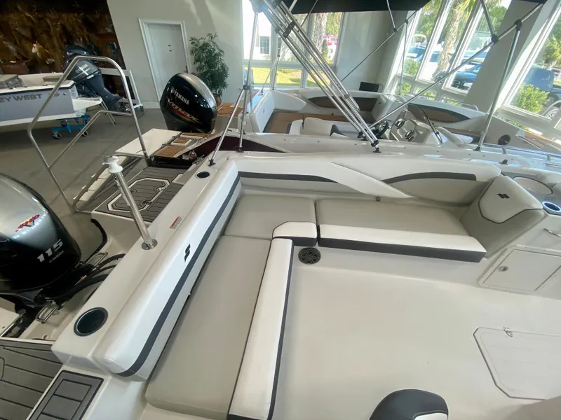 Slide: The Image of 2024 Starcraft SVX 191 boat interior with seating and outboard motor. - 7