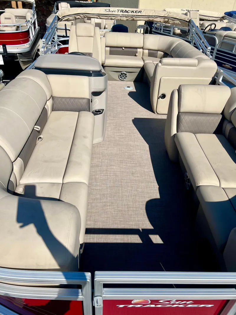 Slide: The Image of 2024 Sun Tracker Party Barge 20 DLX pontoon boat with spacious seating and modern design. - 2