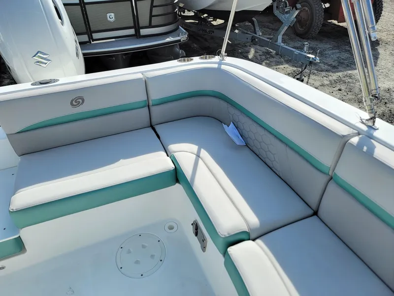 Slide: The Image of 2024 Hurricane SunDeck Sport 192 RL OB boat interior with cushioned seating. - 14