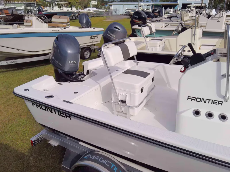 Slide: The Image of 2024 Frontier 180 boat with 115 HP engine on display. - 2