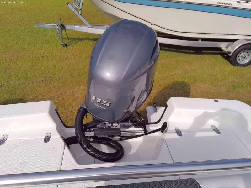 Slide: The Image of 2024 Frontier 180 boat with Yamaha 115 outboard motor. - 7