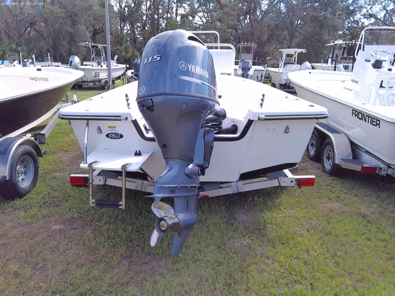 Slide: The Image of 2024 Frontier 180 boat with Yamaha 115 outboard motor, rear view. - 8