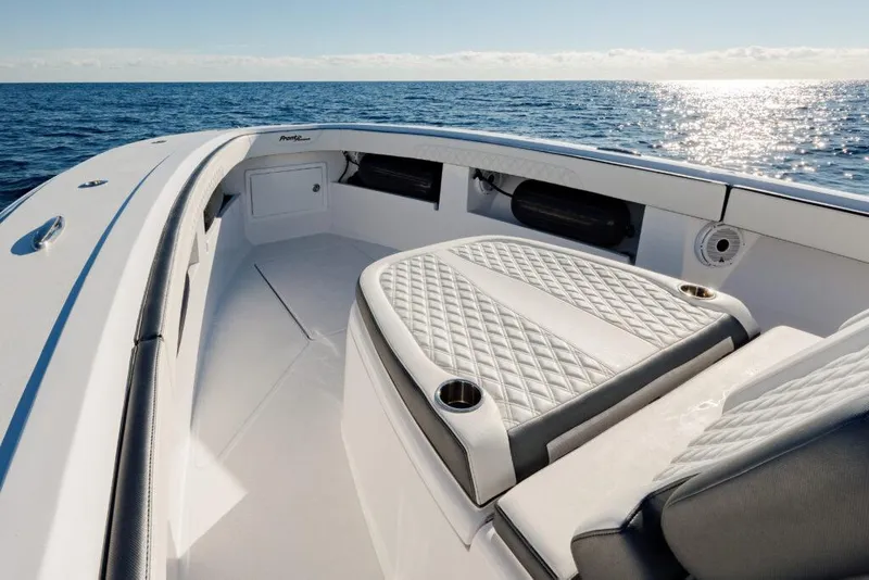 Slide: The Image of 2025 Front Runner 36 CC Custom boat interior with ocean view, featuring luxurious seating. - 12