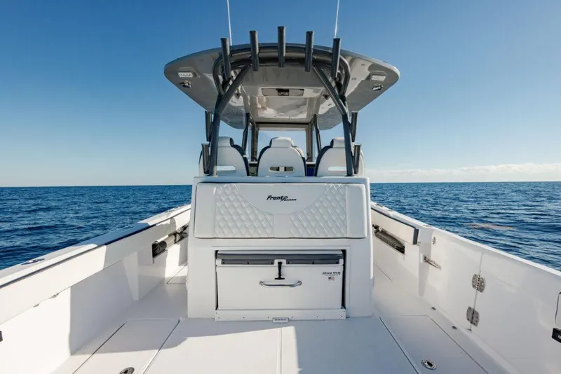 Slide: The Image of 2025 Front Runner 36 CC Custom boat on open sea, showcasing sleek design and spacious deck. - 8