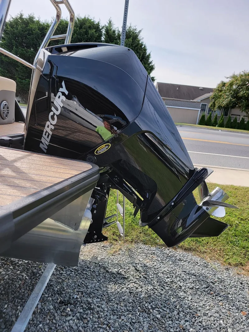 Slide: The Image of 2024 Harris Sunliner 210 with Mercury outboard motor. - 37