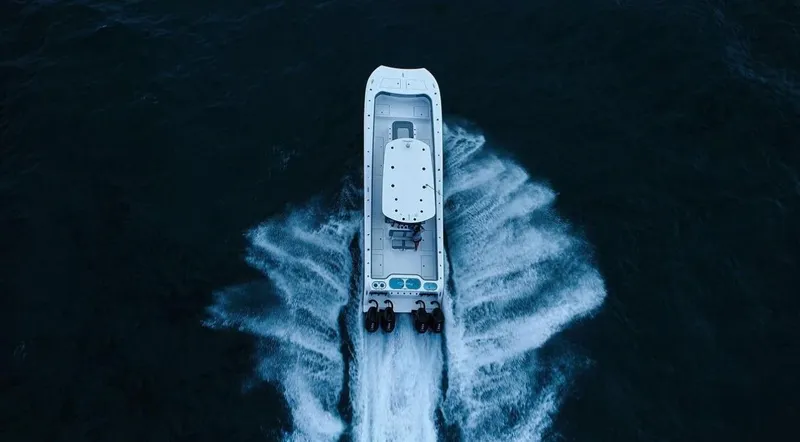 Slide: The Image of Aerial view of 2024 Front Runner 37 Catamaran cruising on the ocean. - 20