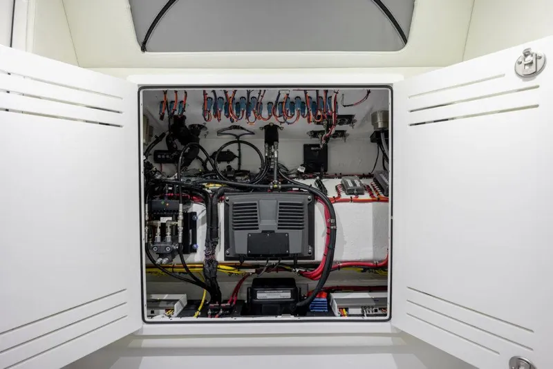 Slide: The Image of Electrical system compartment of 2024 Front Runner 39 CC Custom boat. - 16