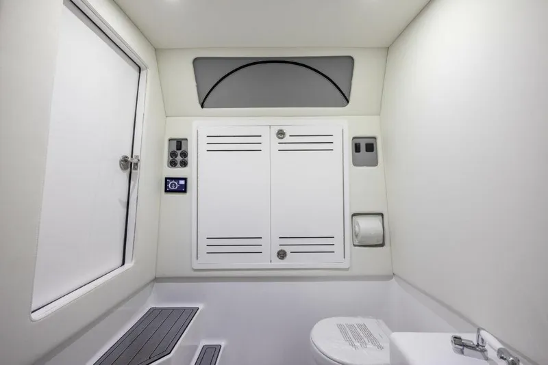 Slide: The Image of 2024 Front Runner 39 CC Custom boat bathroom with modern amenities. - 24