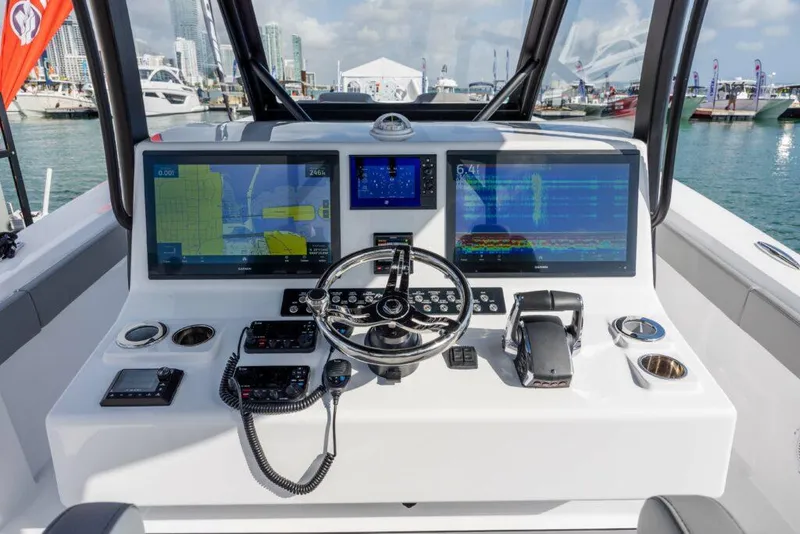 Slide: The Image of 2024 Front Runner 39 CC Custom boat dashboard with advanced navigation and control systems. - 4