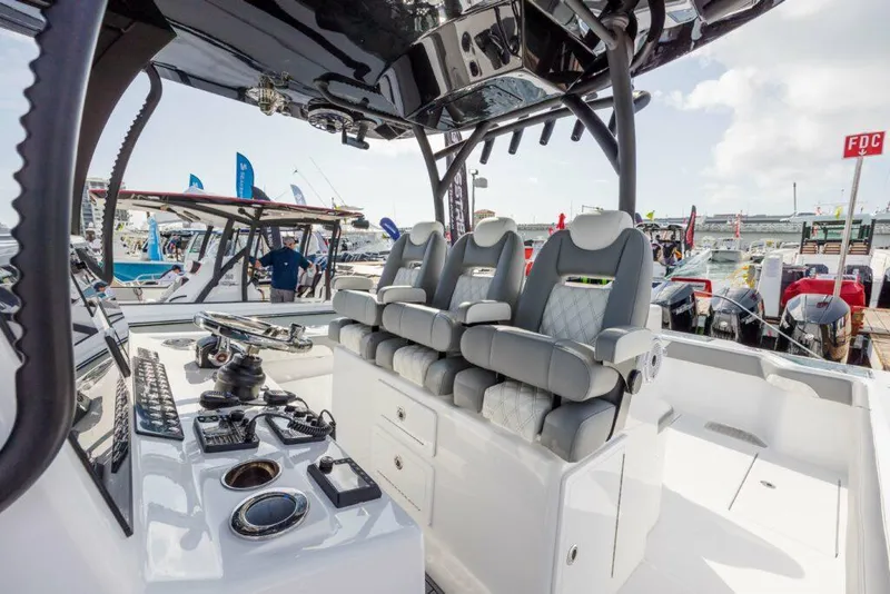 Slide: The Image of 2024 Front Runner 39 CC Custom boat interior with luxury seating and advanced controls. - 7