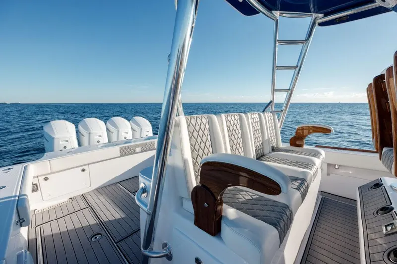 Slide: The Image of 2024 Front Runner 47 CC Custom boat interior with luxurious seating and ocean view. - 29