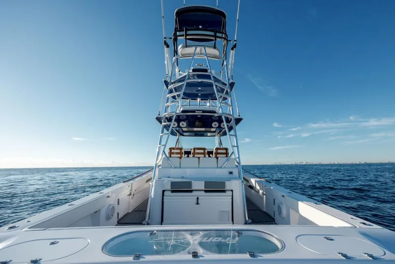 Slide: The Image of 2024 Front Runner 47 CC Custom boat on open water. - 8