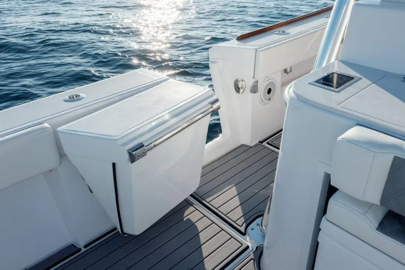 Slide: The Image of 2024 Front Runner 47 CC Custom boat deck with storage compartment. - 9