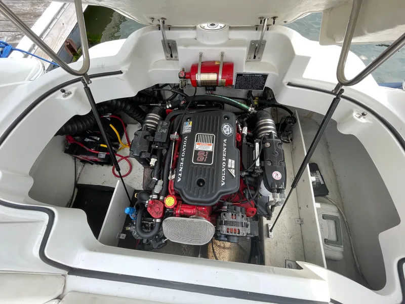 Slide: The Image of 2006 Cobalt 24SX boat engine compartment with open hatch. - 30